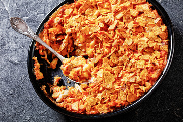 nacho chicken cheese casserole in baking dish