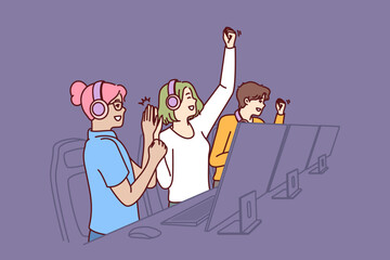 Team of delighted esports players participating in gamer competition in online multiplayer game or MMORPG. Teenage boys and girls sit at table with computers and celebrate victory in tournament © drawlab19