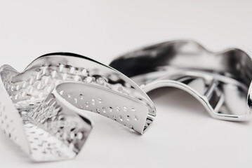 Basic orthodontic dentist tools on white background.