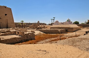 A mosque standing in the neighborhood of the Luxor Temple.