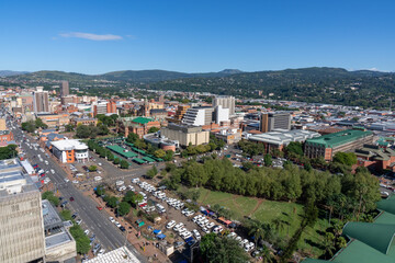 Fototapeta na wymiar A panoramic view of downtown Pietermaritzburg, Kwazulu-Natal, with surrounding hills in the background.