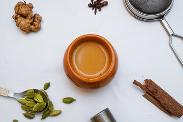 Popular indian tea beverage Kulhad chai or masala chai on white background