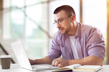 young business male working on computer