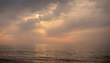 Naklejka na ściany i meble Sunset on the sea, sky with clouds, summer.