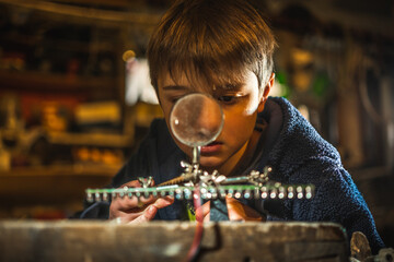 Boy playing with tools