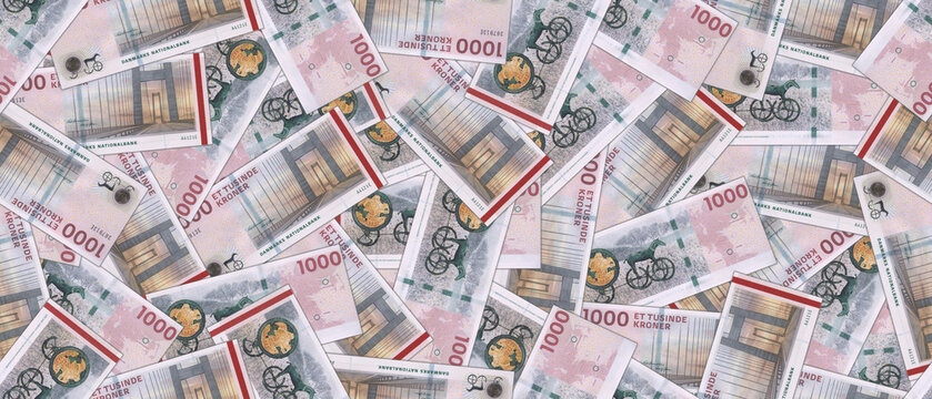 Financial illustration. Wide seamless pattern. Randomly scattered paper banknotes of 1000 Danish krone. Wallpaper or background.