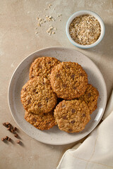 Oatmeal healthy cookies with peanut butter and chocolate chips in a plate. Top view