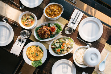 Famous Thai food on the wooden table for the breakfast