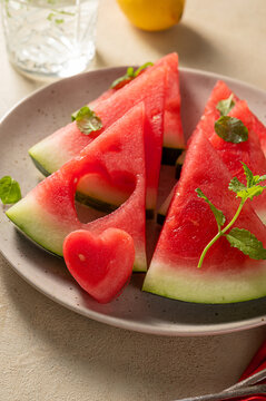Fresh slices of watermelon in a plate. Summer abstract texture.