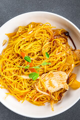 noodles chicken meat, vegetable meal food snack on the table copy space food background rustic top view