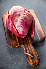 meat heart raw offal pork or beef meal food snack on the table copy space food background rustic top view 