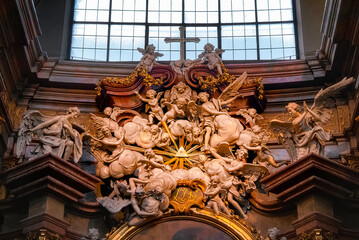 Low angle shot of sculptures of angels at the alter of a church in Vienna, Austria