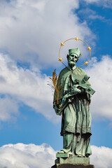 Detail view of statue St. John of Nepomuk on Charles bridge, Prague. Czech Republic.