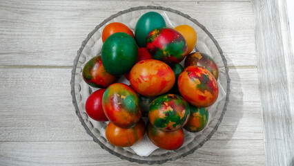 A very beautiful easter eggs in a tray.