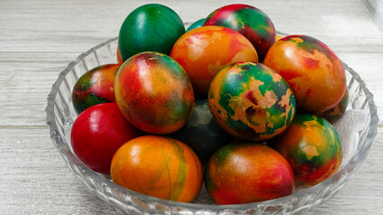 A very beautiful easter eggs in a tray.