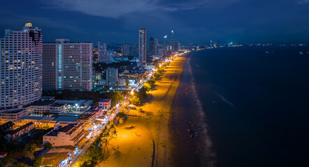 Jontien beach on night time in Pattaya city - obrazy, fototapety, plakaty