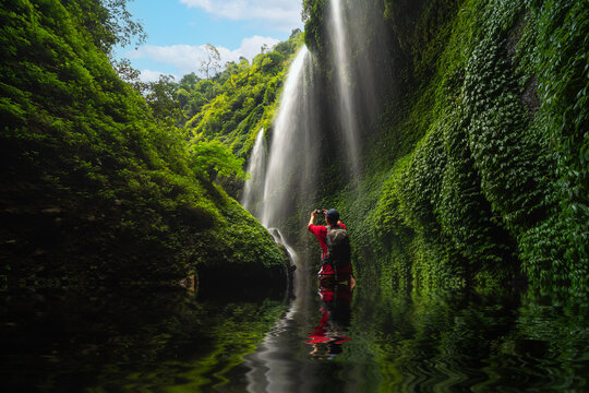 Asian traveller Man in Madakaripura Waterfall