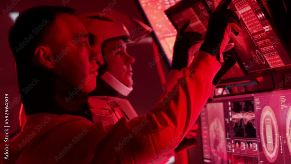 Wall mural team of astronauts in a space suits aboard the mars station. a crew of cosmonauts piloting the space