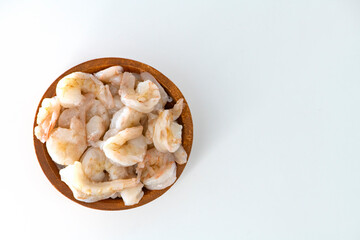 .Fresh Raw shrimps cleaned and kept it in a wooden bowl. Raw shrimps in wooden bowl...
