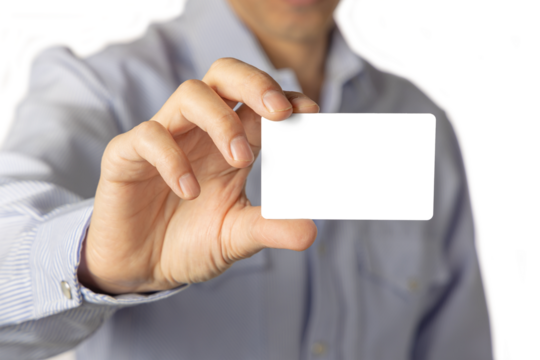 Close up of a man holding a blank card. Selective focus.