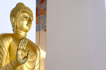 golden buddha statue in asian temple