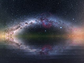 The Milky Way and a night sky full of stars reflected in calm waters © McCarthys_PhotoWorks