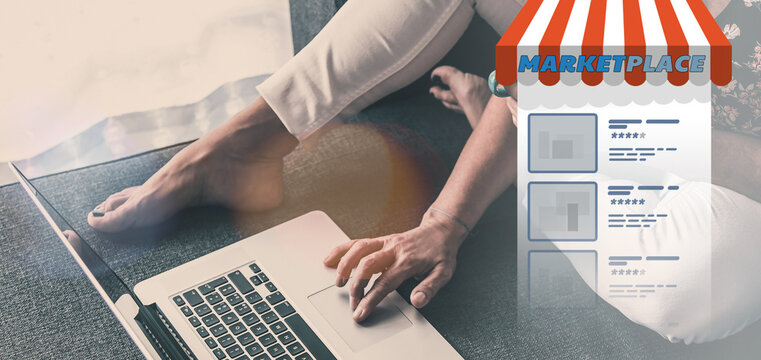 Woman using laptop to open her own shop in  marketplace. Selling online, dropshipping concept.