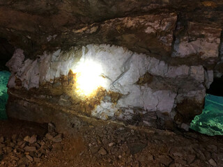 Light shining on a quartz vein full of gold