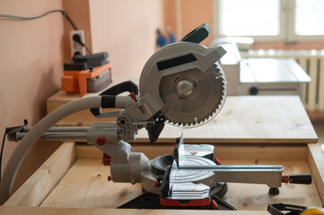 Close-up of a circular saw in a workshop.