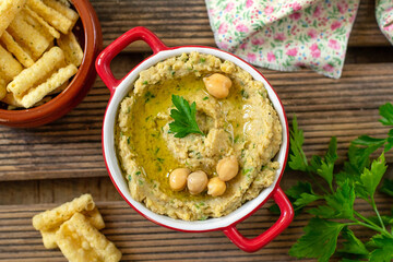 Arab traditional dip spread Hummus from mashed chickpeas - 592986996