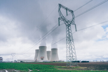 The cooling towers of the Temelín nuclear power plant with a cloudy sky in the background. Nuclear...