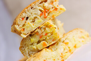 Pieces of delicious cabbage pie, close-up