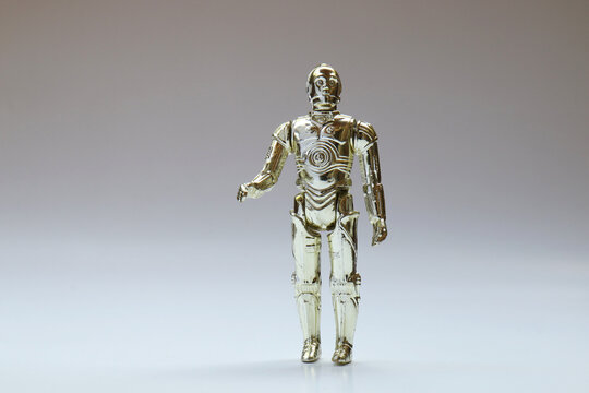 Vintage Star Wars C-3PO Action Figure from Kenner Toys on White. This was released with the Movie "The Empire Strikes Back". C-3PO's limbs were removable.