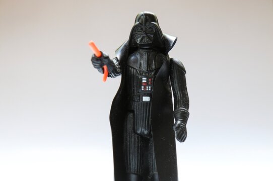 Vintage Star Wars Darth Vader Action Figure from Kenner with Lightsaber on white. Probably from 1978.
