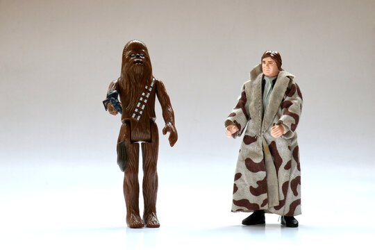 Vintage Star Wars Han Solo with Trench Coat and Chewbacca Action Figures from Kenner Toys on White. This was released with the Movie "Star Wars" and "Return of the Jedi".