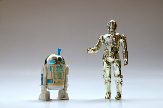 Vintage Star Wars C-3PO and R2D2 with Sensorscope Action Figures from Kenner Toys on White. This was released with the Movie "The Empire Strikes Back". C-3PO's limbs were removable.