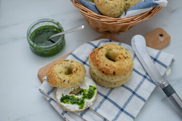 home made whole grain Bagels with wild garic on a table