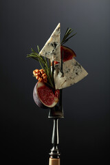 Blue cheese with figs, walnuts, and rosemary.