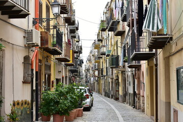 narrow street in town Cefalu on island Sicily,Italy