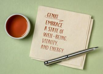 Japanese concept of genki - embrace a state of well-being, vitality, and energy. Inspirational note on a napkin. Personal development concept.