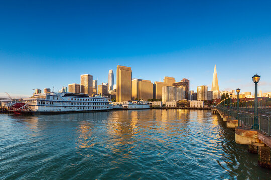Large boat at harbor with cityscape in the background in San Francisco, California
