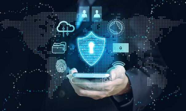 Securely Exploring the Global Digital World: Businessman's Hand Holds Smartphone with Virtual Shield and Internet Activity Icons. Cybersecurity and Internet protection concept