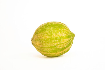 Close-up of pink lemons with stripes on a white background