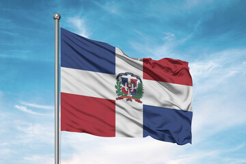 Fototapeta na wymiar Dominican Republic national flag cloth fabric waving on beautiful sky Background.