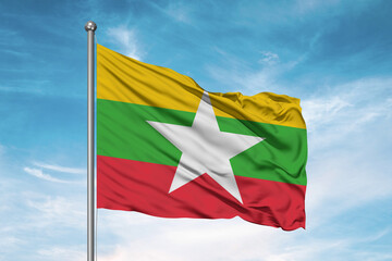Myanmar (Burma) national flag cloth fabric waving on beautiful sky Background.