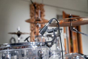 Fototapeta na wymiar Drum kit recording microphone in recording studio