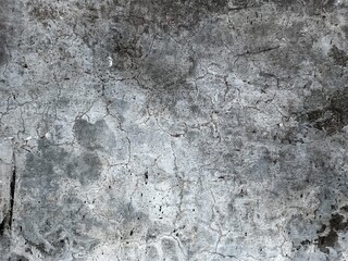 Wall Rough fragment Texture with scratches and cracks.Stucco white wall background.Grey background...
