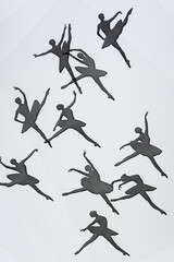 tiny dancers printed on transparency film and photographed on a (more or less) white backlit surface (light table) - somewhat variable focus