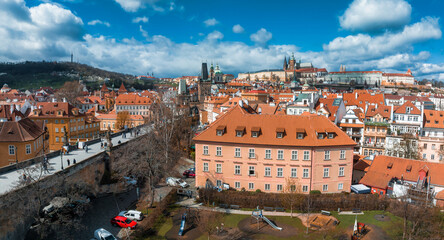 Obraz premium Scenic spring panoramic aerial view of the Old Town pier architecture and Charles Bridge over Vltava river in Prague, Czech Republic
