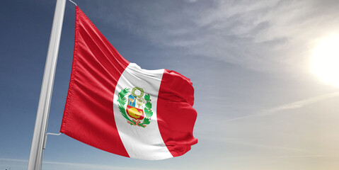 Naklejka premium Peru national flag cloth fabric waving on beautiful sky grey Background.
